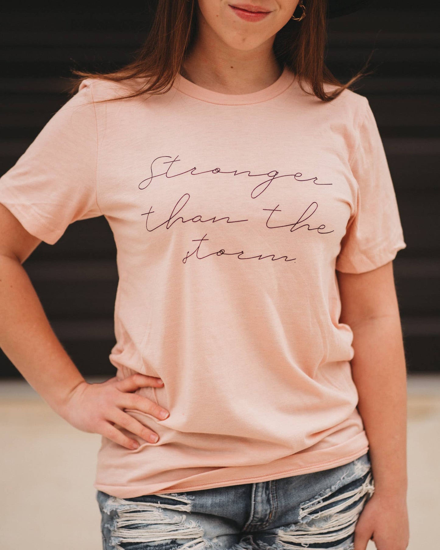 Stronger Than The Storm Graphic Tee